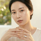 Blossom Solitaire Ring worn by model