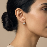 Delphinium Huggie Hoops worn by model