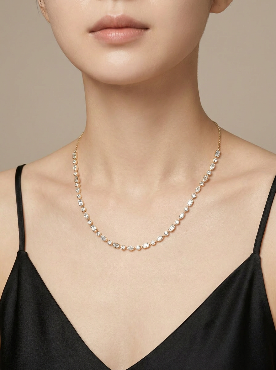 Saffron necklace worn — mixed-cut bezel-set diamonds in yellow gold