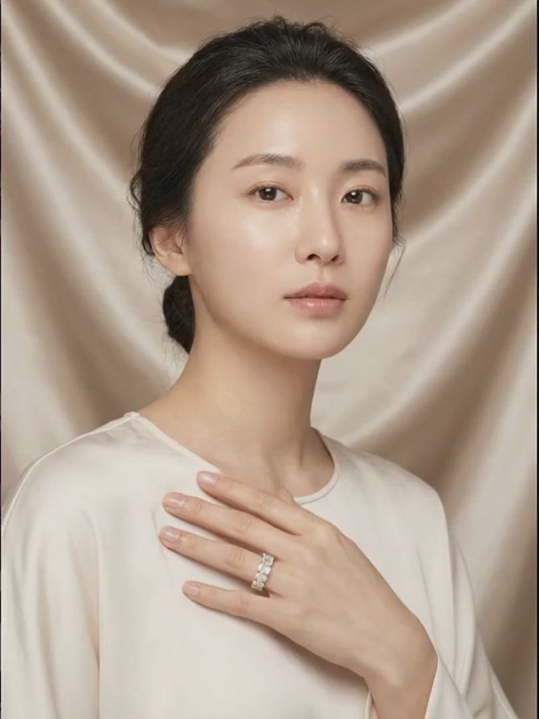 heather-diamond-band worn by model, hand resting over her heart